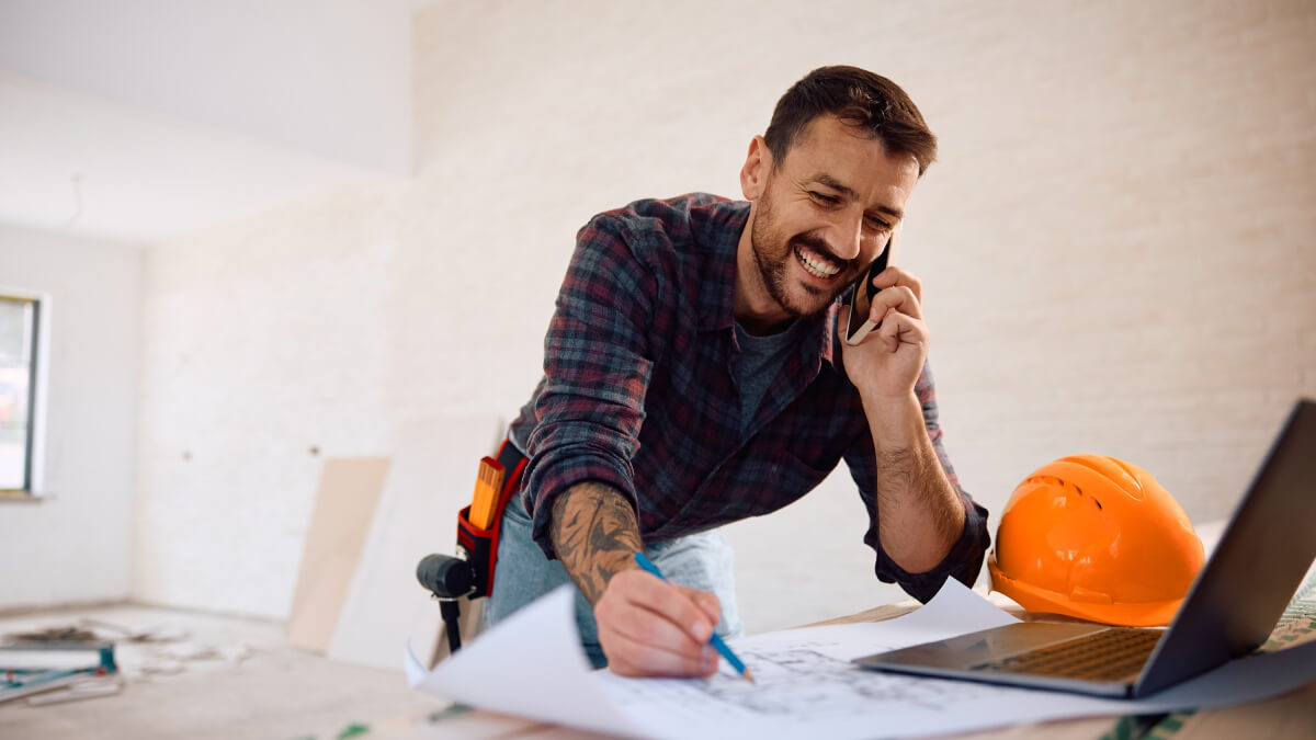 Construction worker on phone