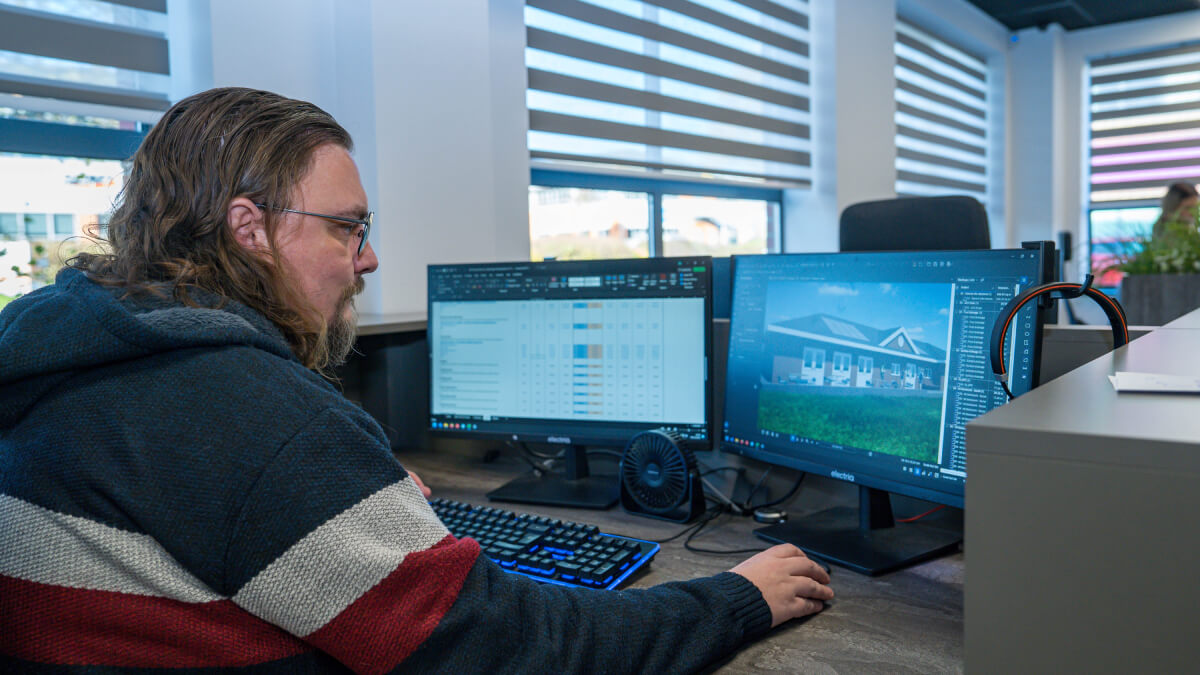 man at computer Bhangals