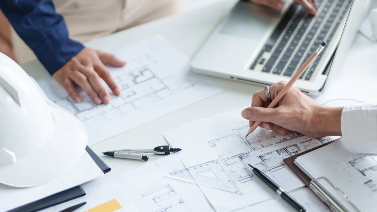 Construction meeting with equipment